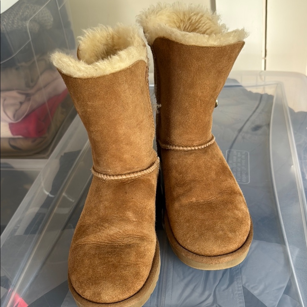 Cozy tan 8” Ugg Shearling Boots with gold zippers